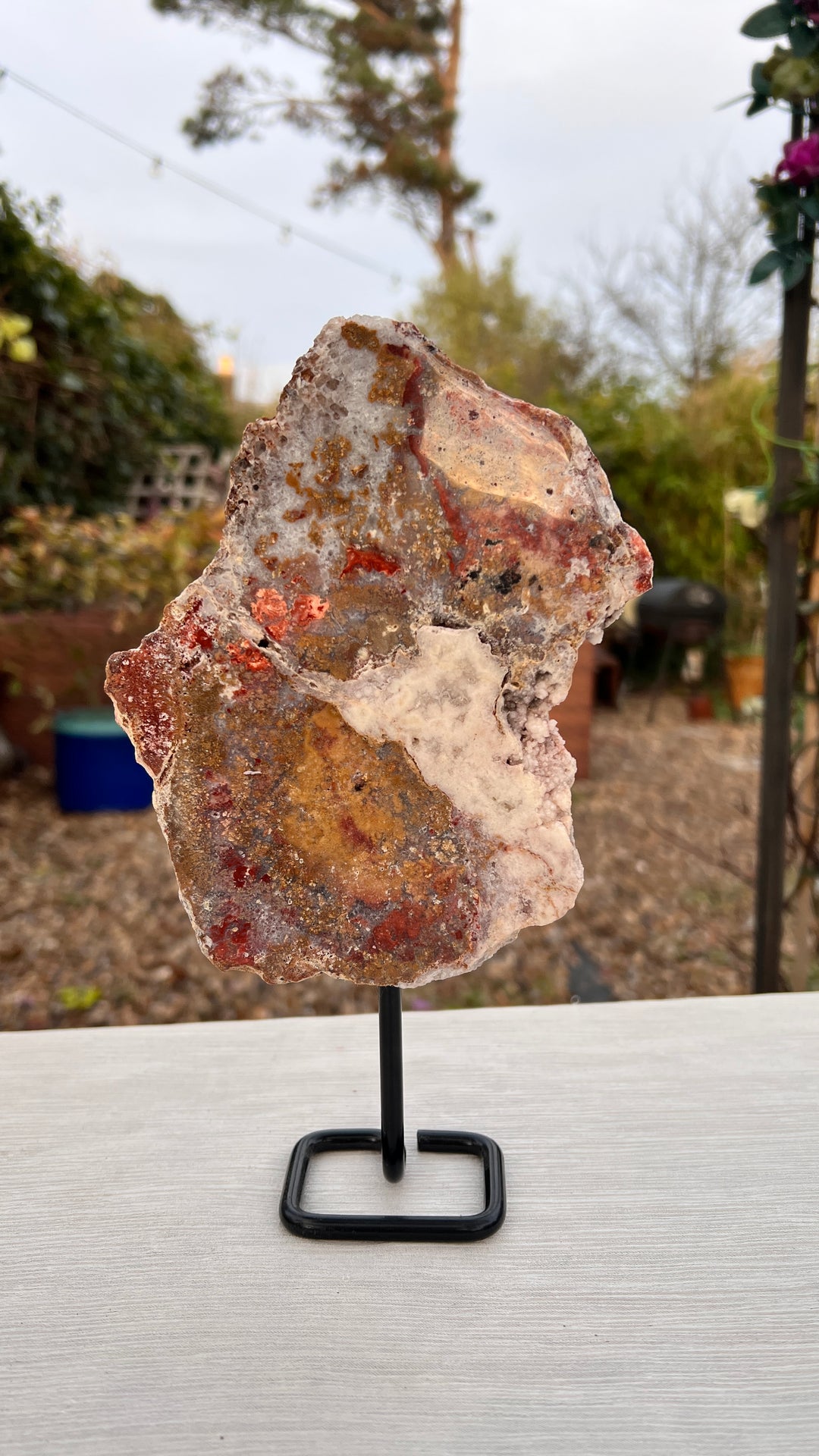 Elegant Pink Amethyst Slab on Black Metal Stand